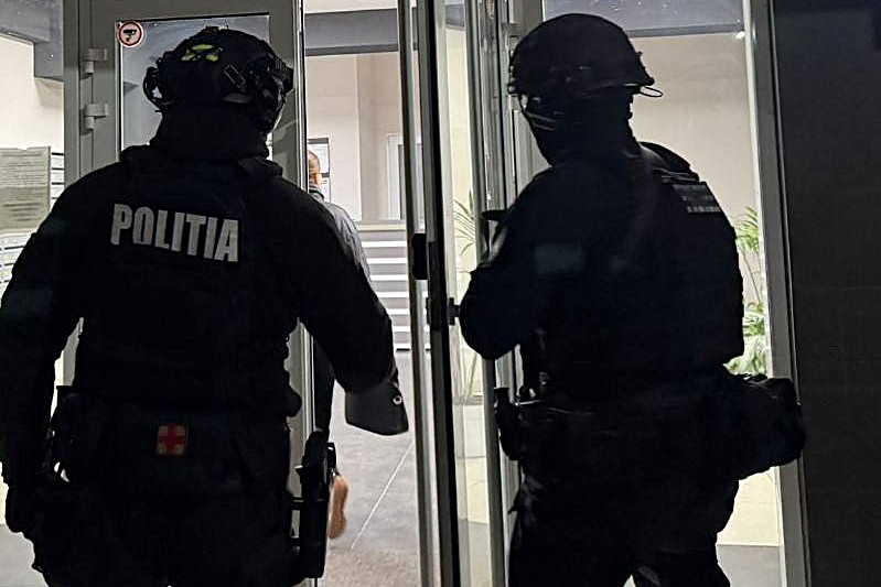 Percheziții în toată țara într-un dosar privind activitatea mercenarilor 1 politia descinbderi
